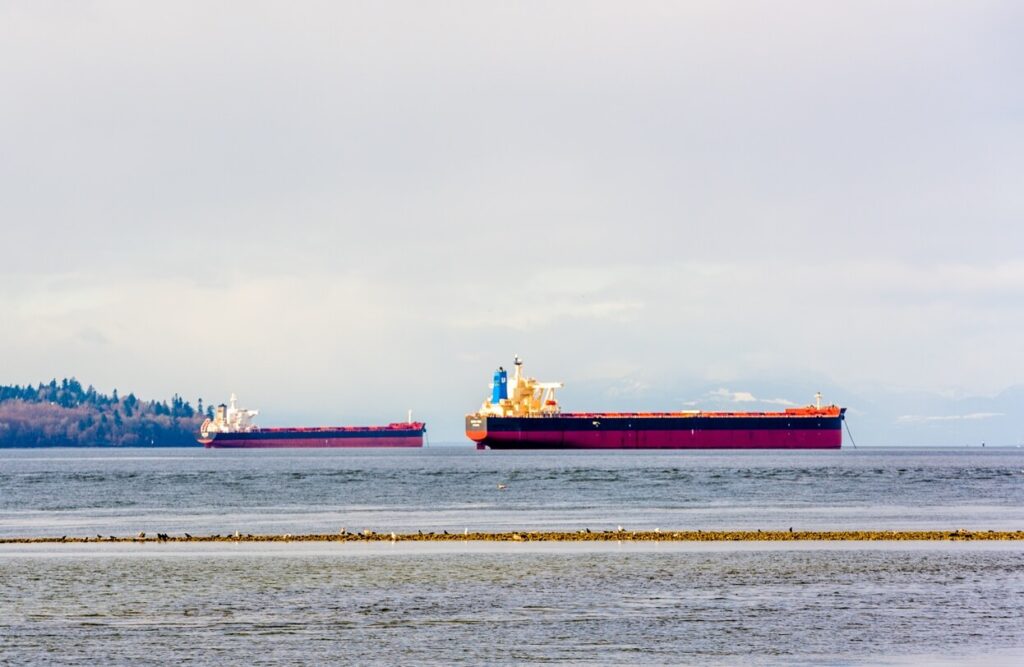 Commercial ships anchored in English Bay, Vancouver, BC.